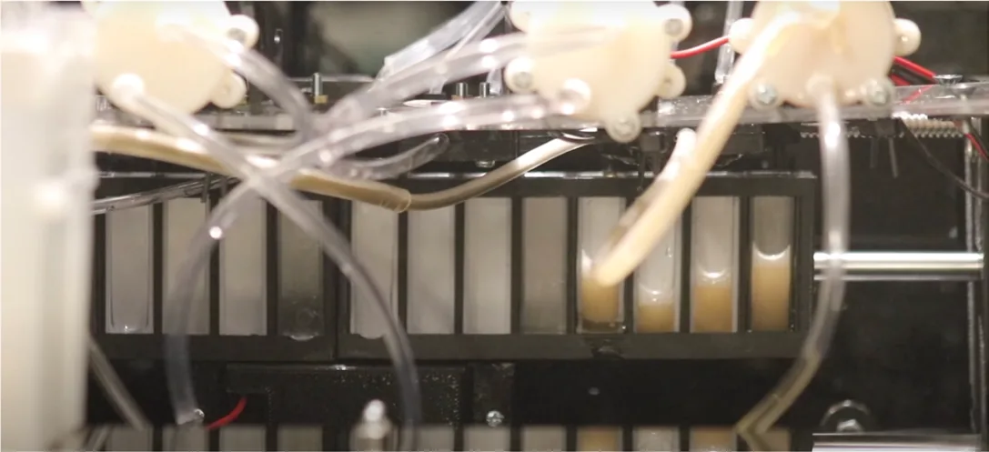 Cuvette carousel, peristaltic pumps and tubing in the slide-analysis system