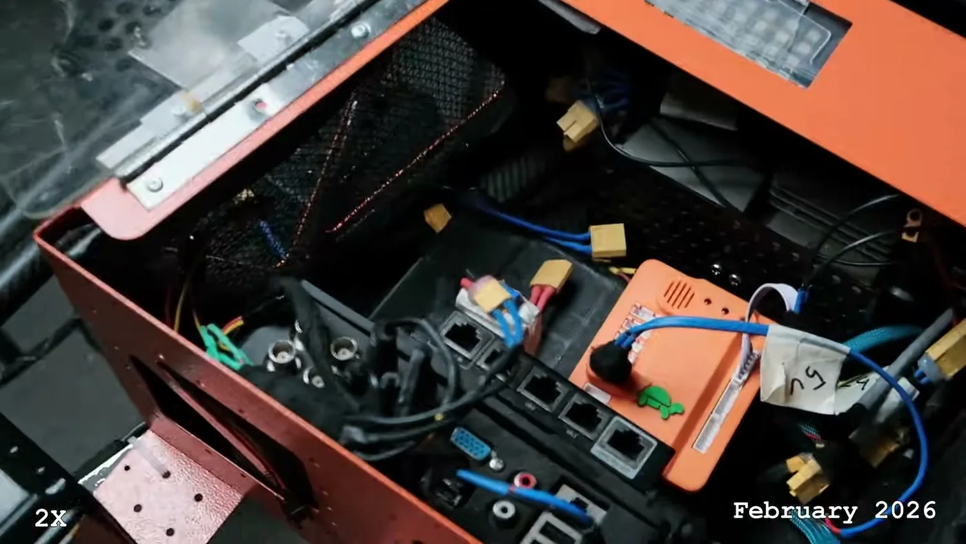 Inside the Taurus electronics bay, showing the carrier board, router and power connectors