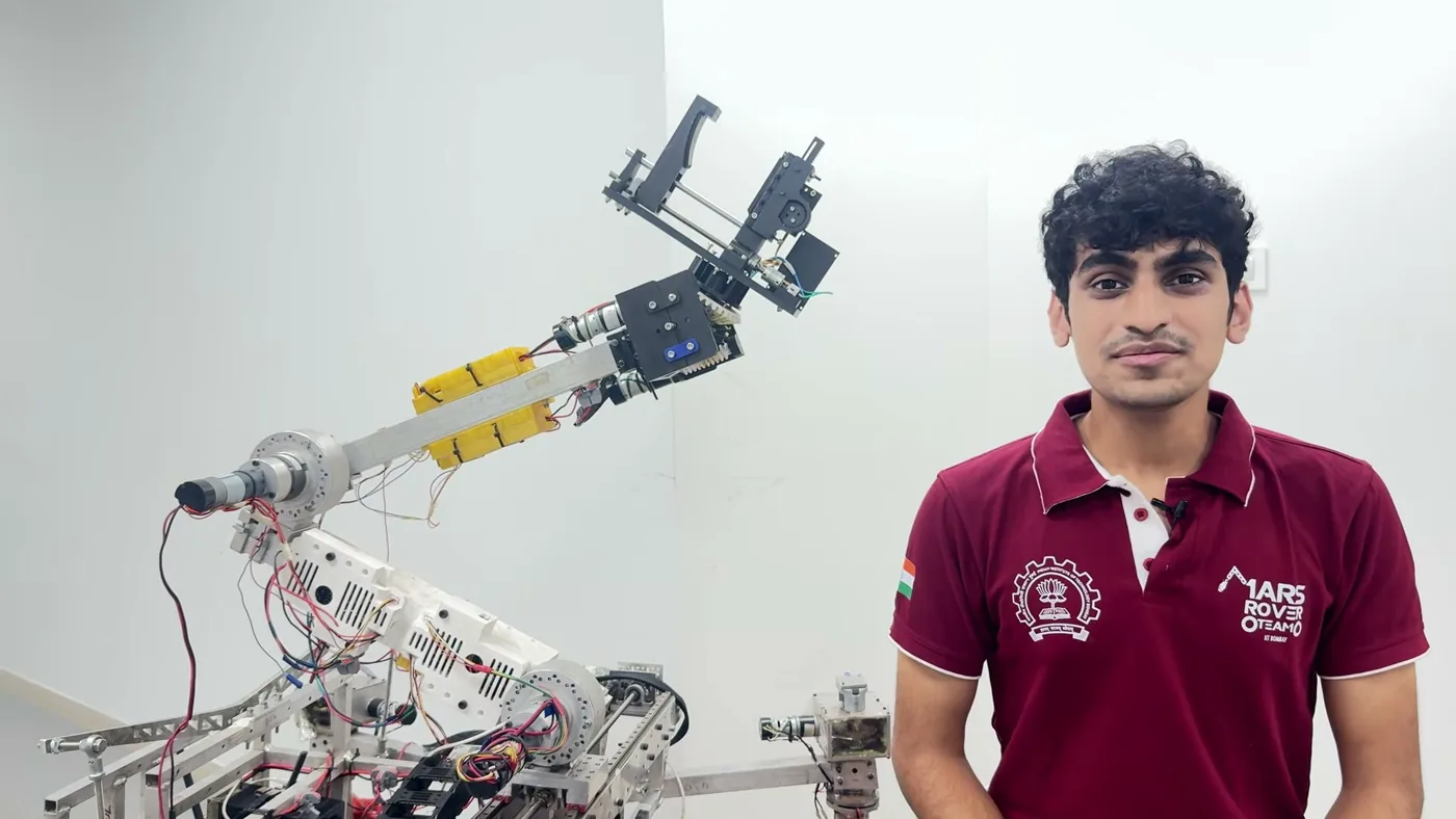 The 2026 rover’s arm, its wrist head with drill and gripper, and battery packs on the boom