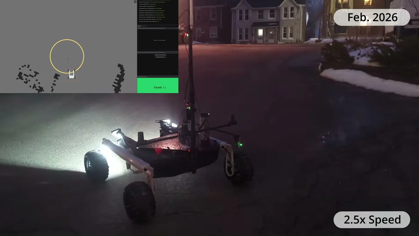 Rover driving at night beside an inset cost map and waypoint display