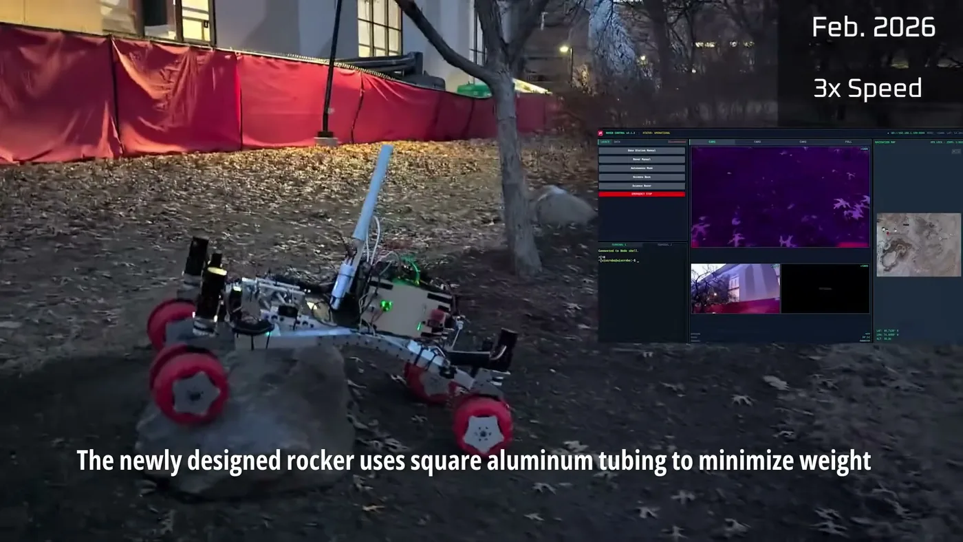 Forward rover on broken ground showing the square-tube rocker and printed wheels